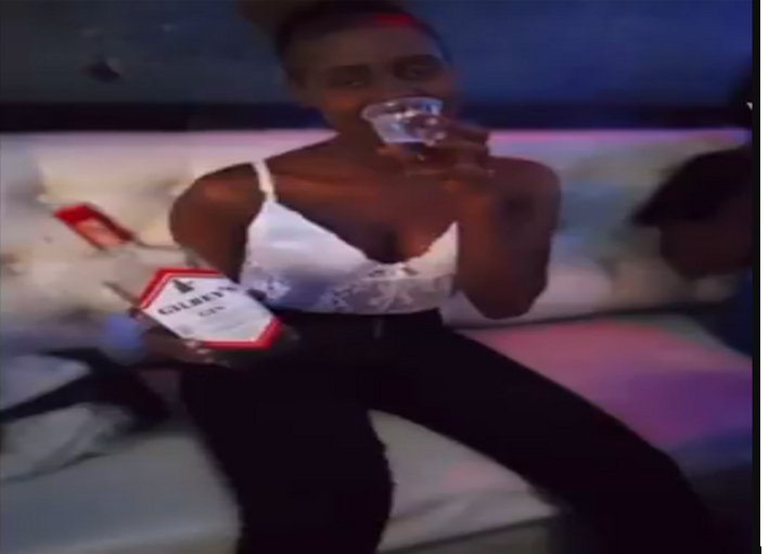 Gilbeys AT it again, Kenyan slay queen loses her mind , runs to the club toilet, crying like a baby (VIDEO)