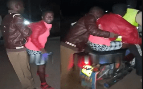 Drama as a man lifts a lady and puts her on a motorbike after buying her drinks and refused to spend the night with him as agreed