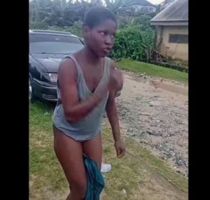 Terrible: Disturbing Video Shows Woman Undressing Herself and Walking Outside N@ked After Finding Her Parents on Her Bed (VIDEO)